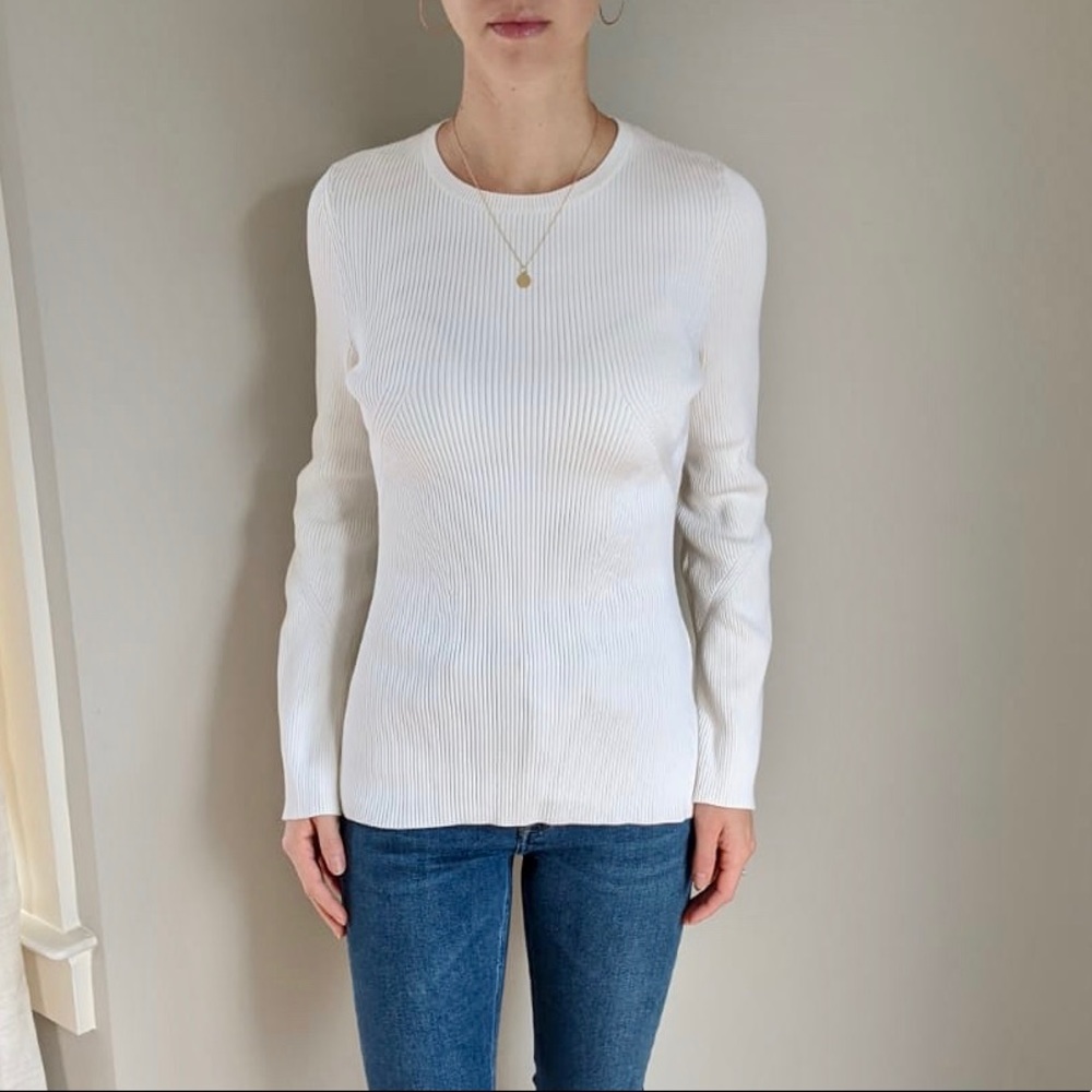 Knit sweater with trumpet sleeves